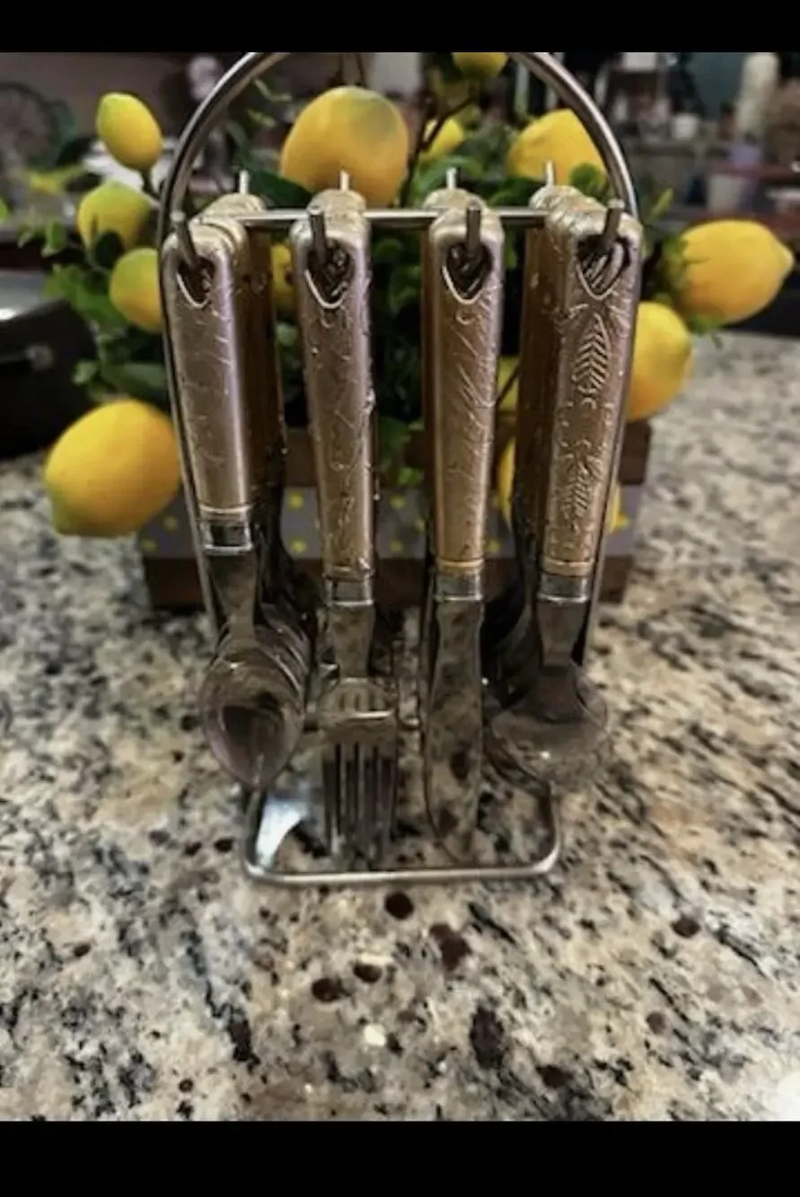 Vintage 24-piece gold-tone cutlery set With matching stand/rack
